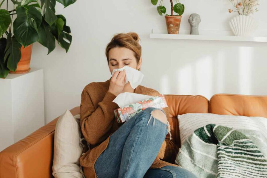 Woman with box of tissues